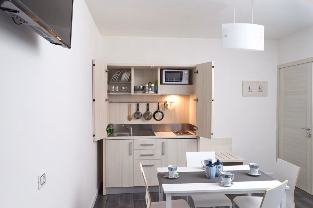 Cucina e zona pranzo dell'appartamento